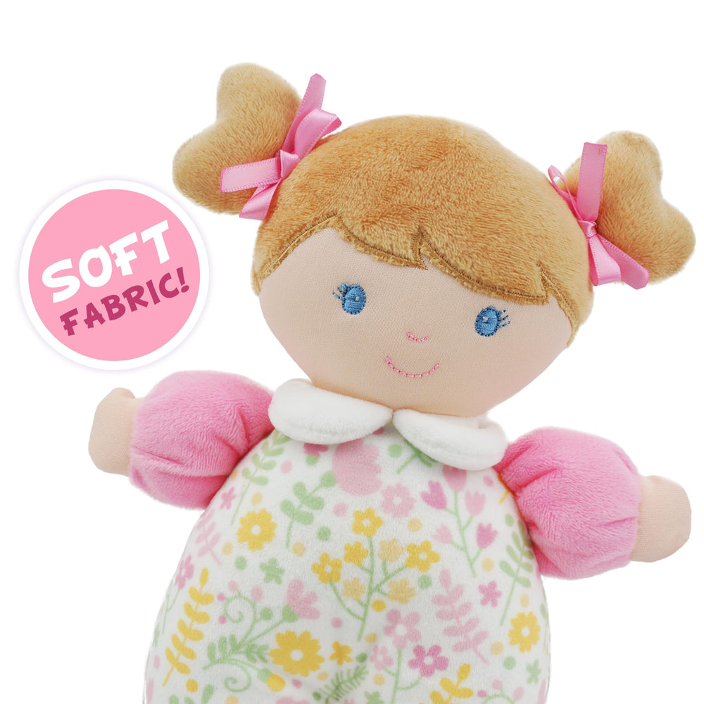 June Garden doll interior rattle provides gentle sensory stimulation during play.