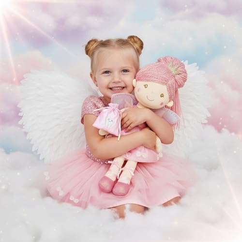 Anastasia doll in pink tulle dress ready for bedtime storytelling.