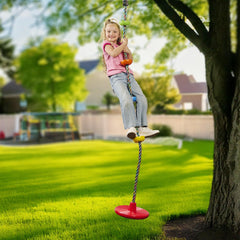 Jungle Gym Kingdom kid enjoying tree swing outdoors