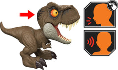 Jurassic World six point five inch tall T-Rex figure held by small hands