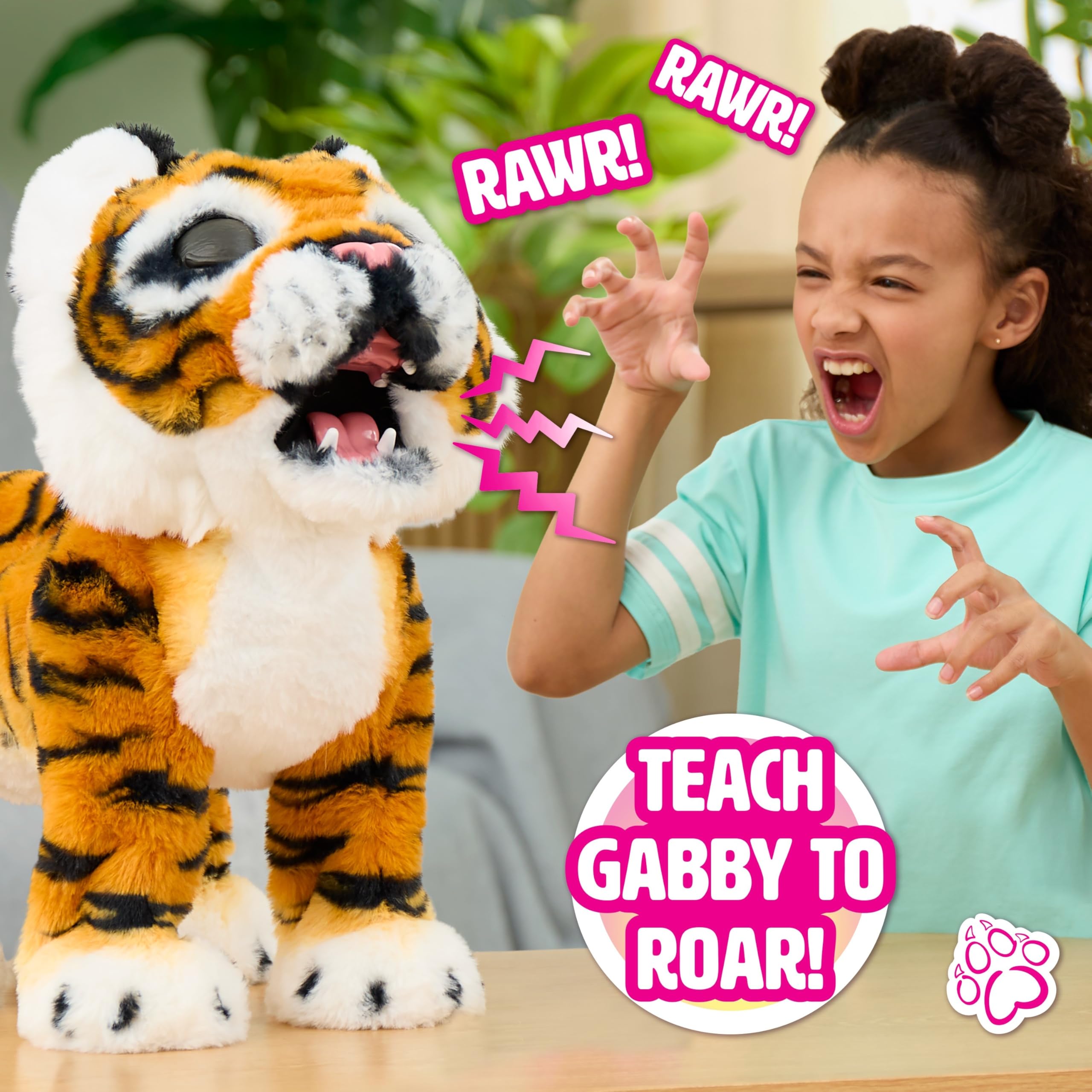 Just Play Gabby grown size comparison showing cub and extended big cat for surprise