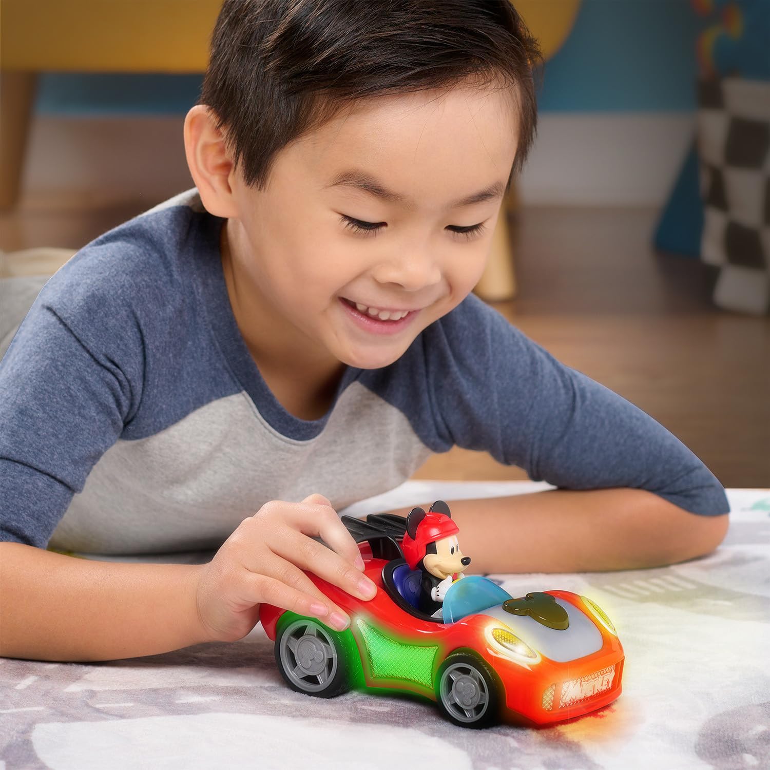 Just Play Mickey Mouse Rev 'n Glow Racer enables imaginative racing and storytelling during playtime.