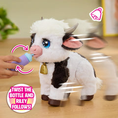 Just Play Riley bottle accessory shown inserted to trigger drinking sounds