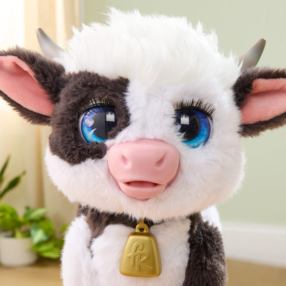Just Play Riley in a playroom setting encouraging nurturing role-play