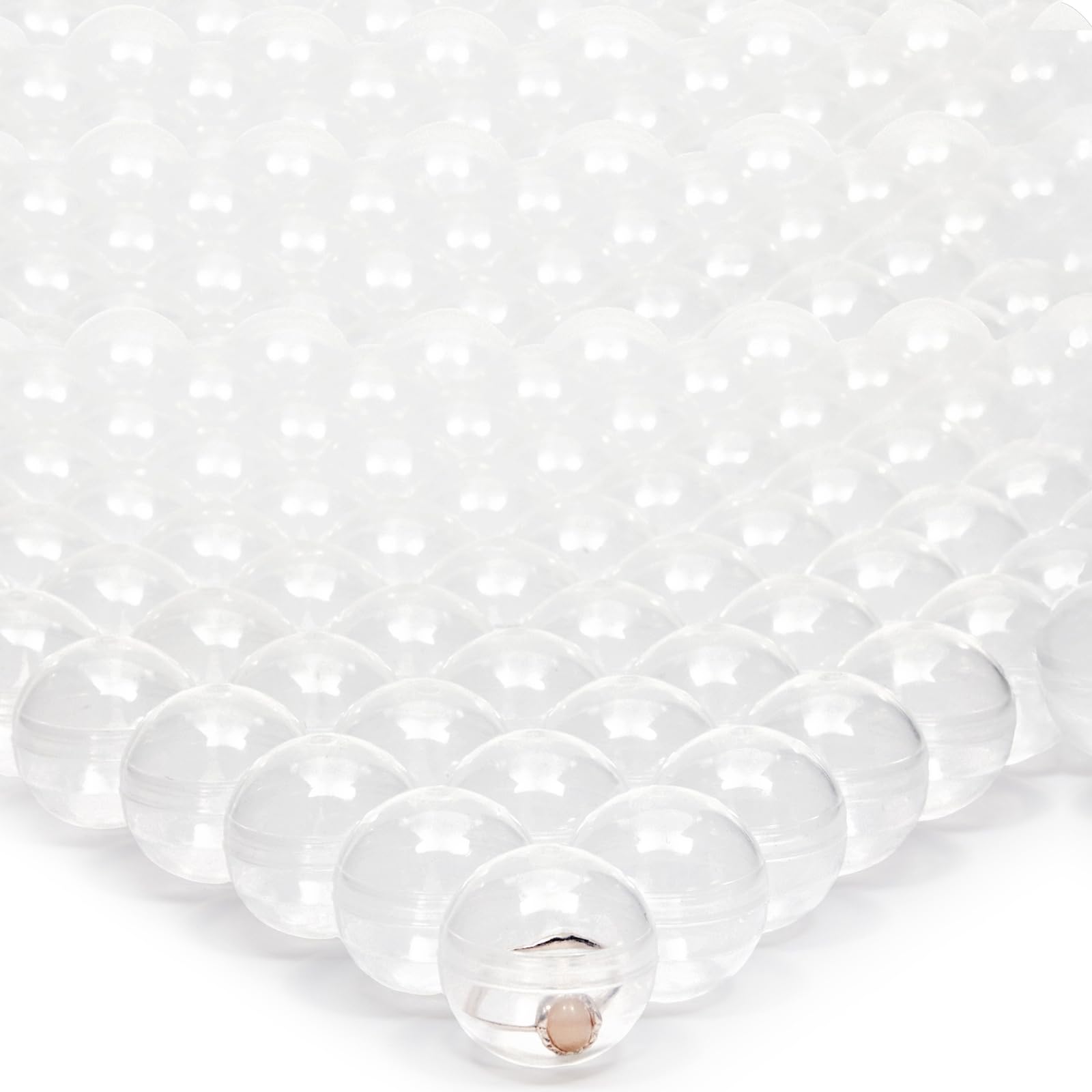 Juvale gumball capsules in clear 1.1-inch diameter with secure lids for prizes.