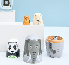 Kakeah long-nosed elephant nesting dolls close-up details emphasize craftsmanship and vibrant animal art.