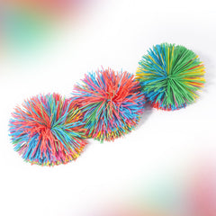 Kaloktuwa rainbow stringy ball held in hand for sensory exploration and focus