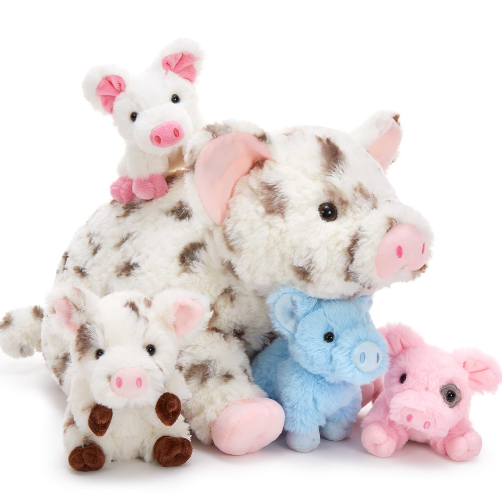 Karister kids cuddling with the pig family during play