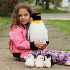 Karister penguin belly surprise babies showing hidden play inside.