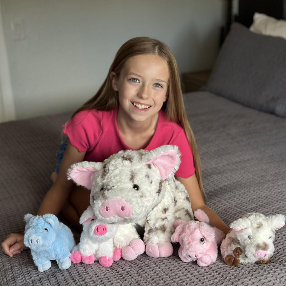 Karister pig family plush in different poses for playtime