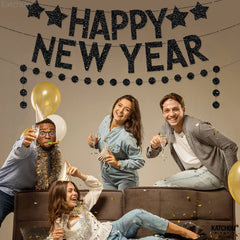 KatchOn black glitter new year banner creates a dramatic backdrop for NYE parties
