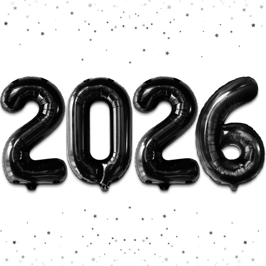 KatchOn Giant 2026 balloons in metallic black create a dramatic NYE backdrop.