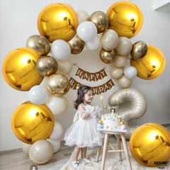 KatchOn 22-inch gold balloon close-up highlighting glossy finish.