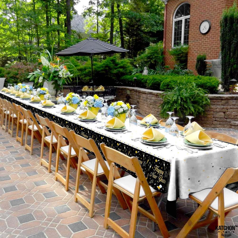 KatchOn tablecloth with gold accents, elevates table styling for New Year celebrations.