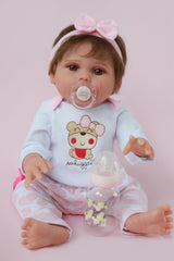 Kaydora 18-inch silicone baby girl held for realistic newborn play.