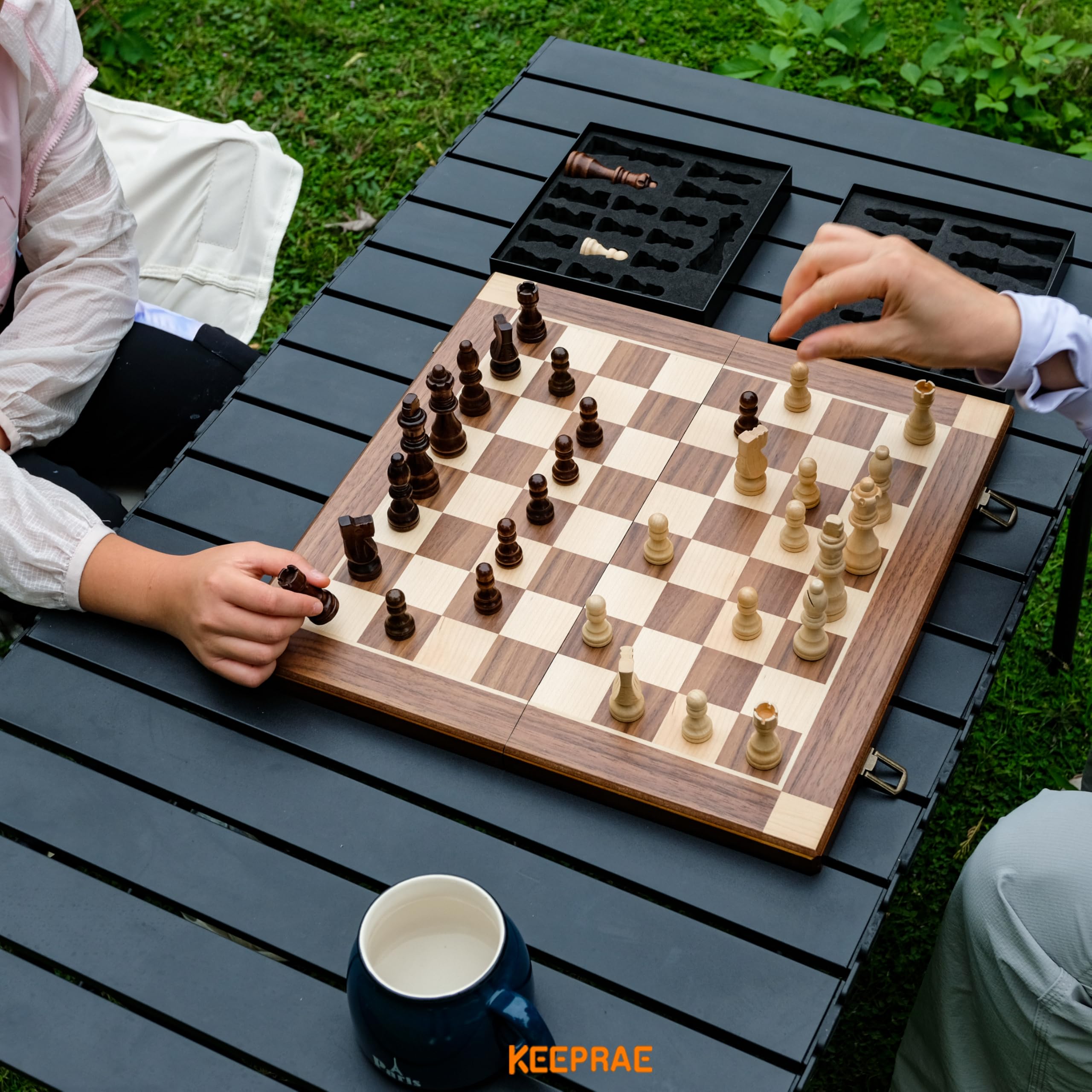 KEEPRAE removable chess piece case keeps pieces organized for quick setup.