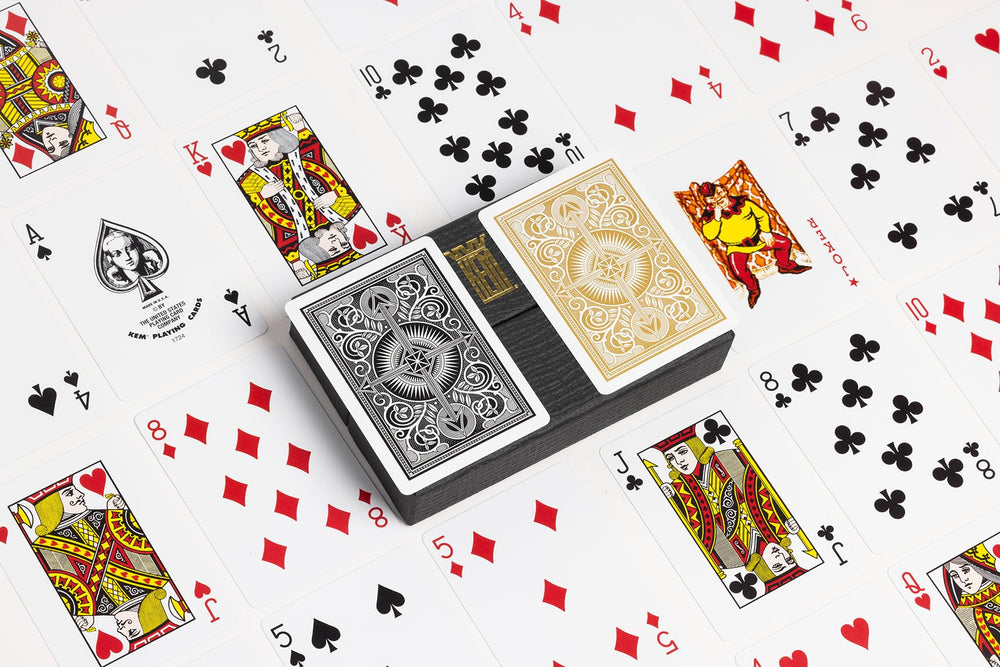 Premium packaging of KEM Arrow Black and Gold gift set for storage.