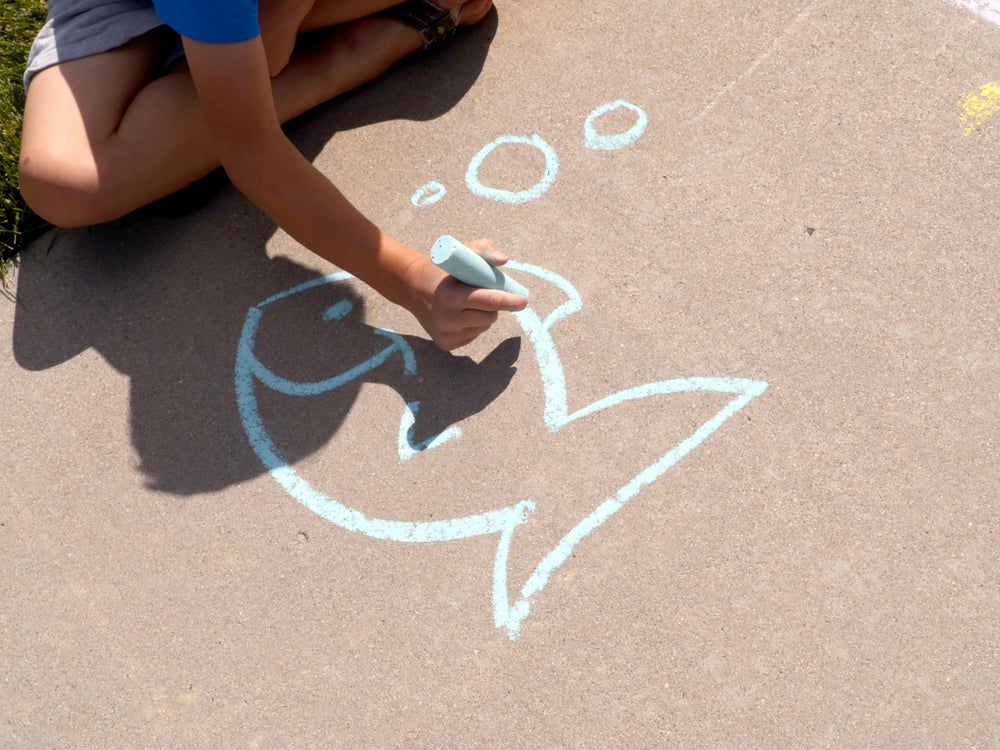 Kid Made Modern washable chalk cleans up quickly from driveways and walls.