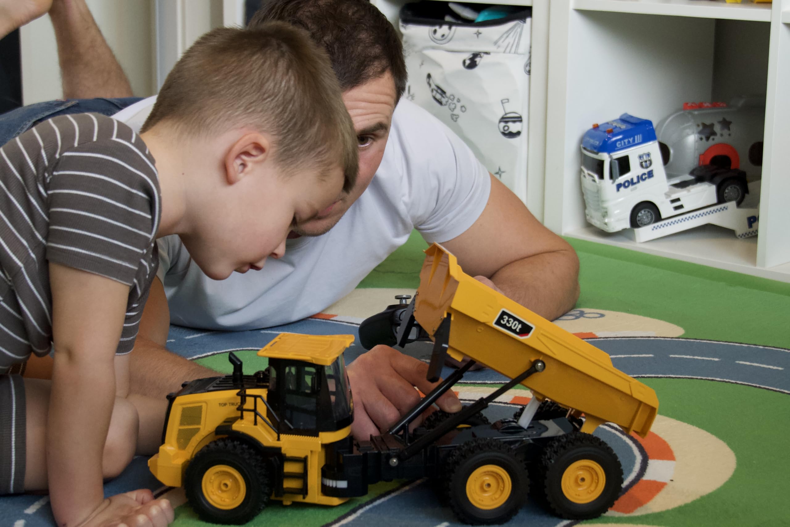 KIDDITOY Mighty 9-Channel RC Dump Truck fleet at home construction site