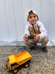KIDDITOY RC dump truck features 360-degree rotation for versatile maneuvering.