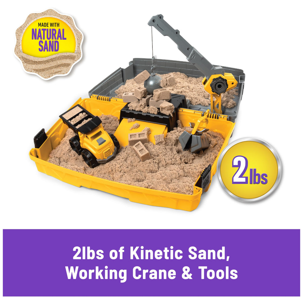 Kinetic Sand crane with wrecking ball and sand bucket demonstrates digging and demolition play.