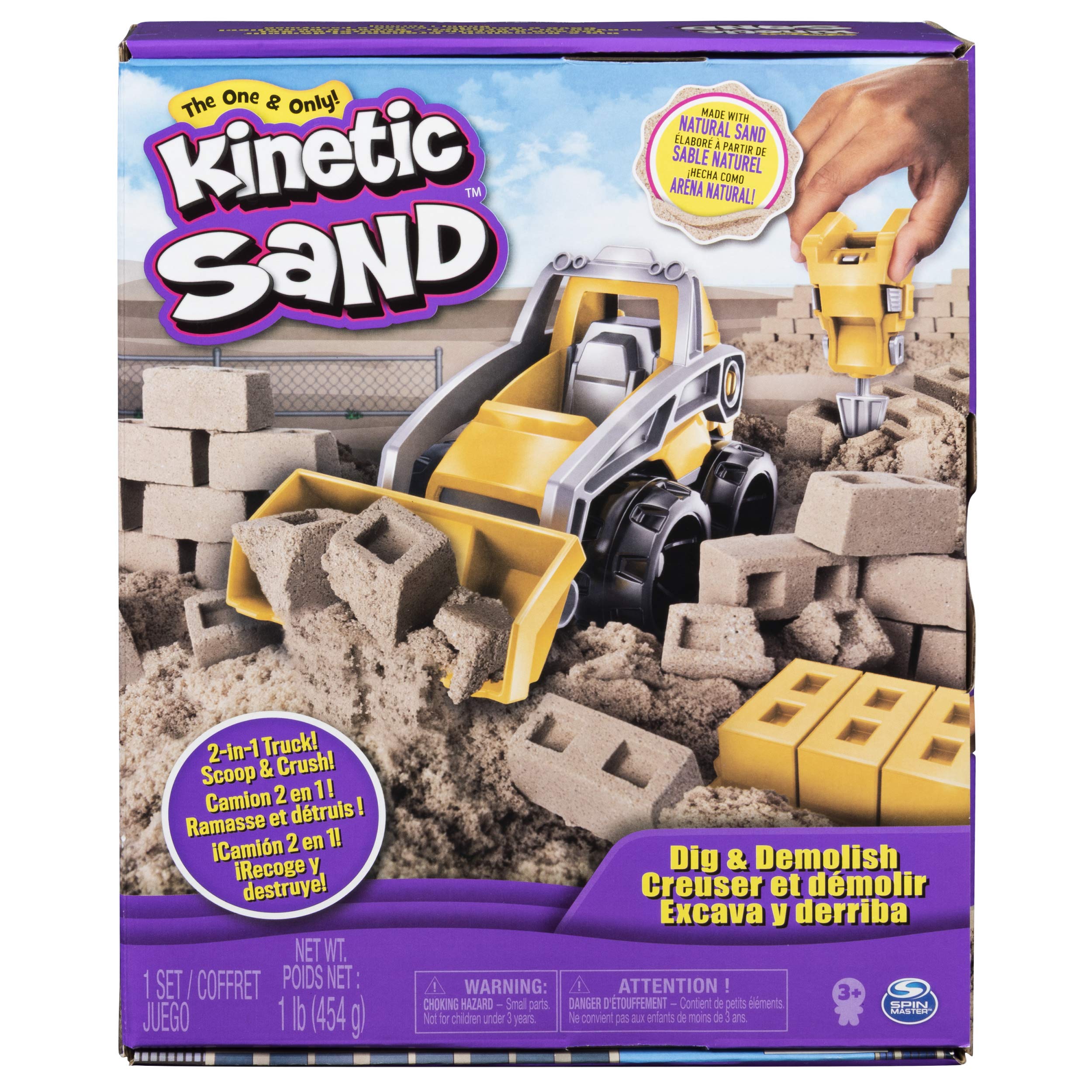 Kinetic Sand Dig N' Demolish front-loader truck shaping sand for construction play.