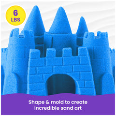 Kinetic Sand being squished by child hands demonstrating calming tactile play