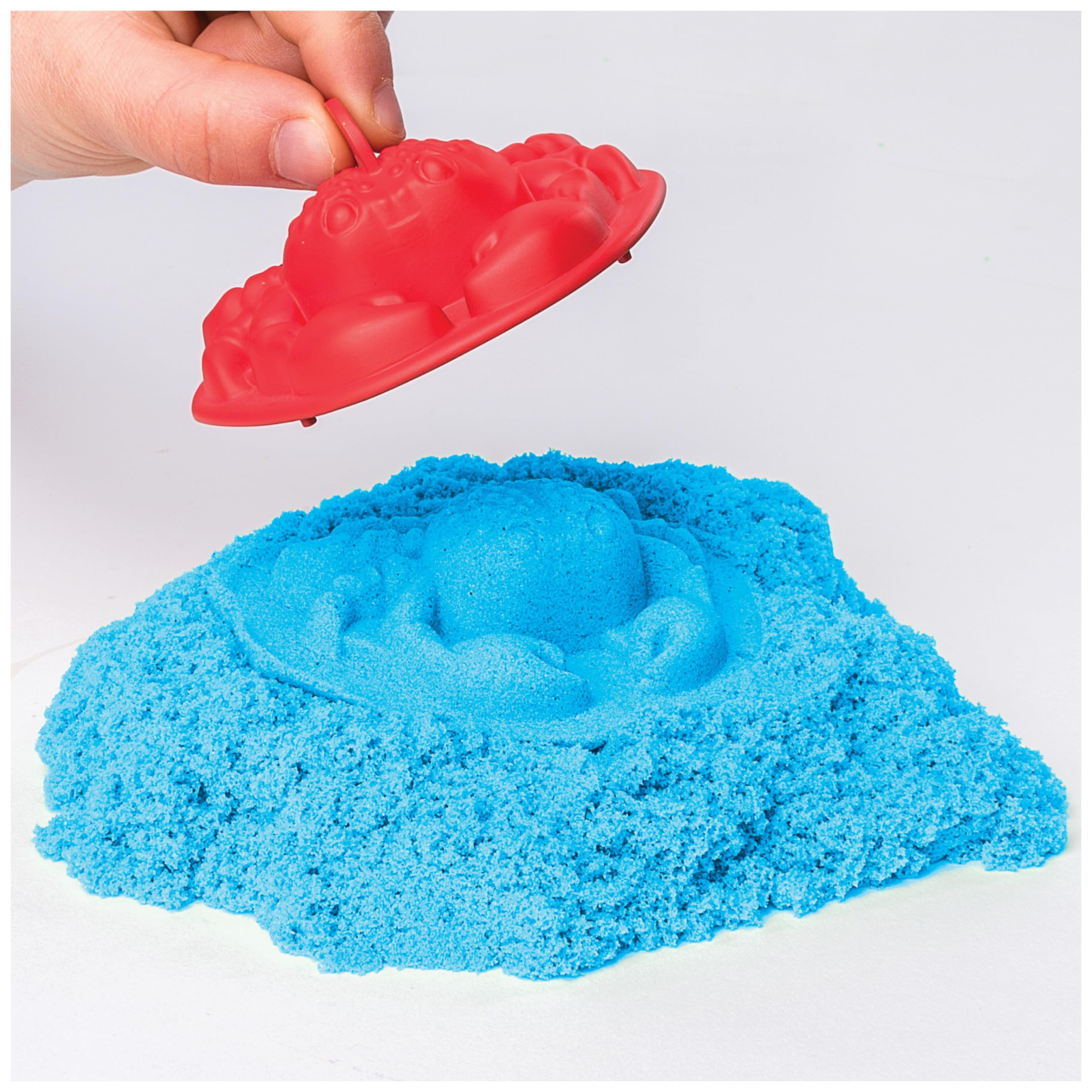 Kinetic Sand molds castles encourage building, planning, and steady hands.