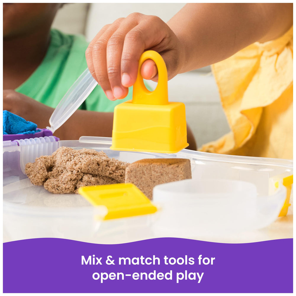 Kinetic Sand neon blue sand ideal for cutting, squishing, and flowing experiments.