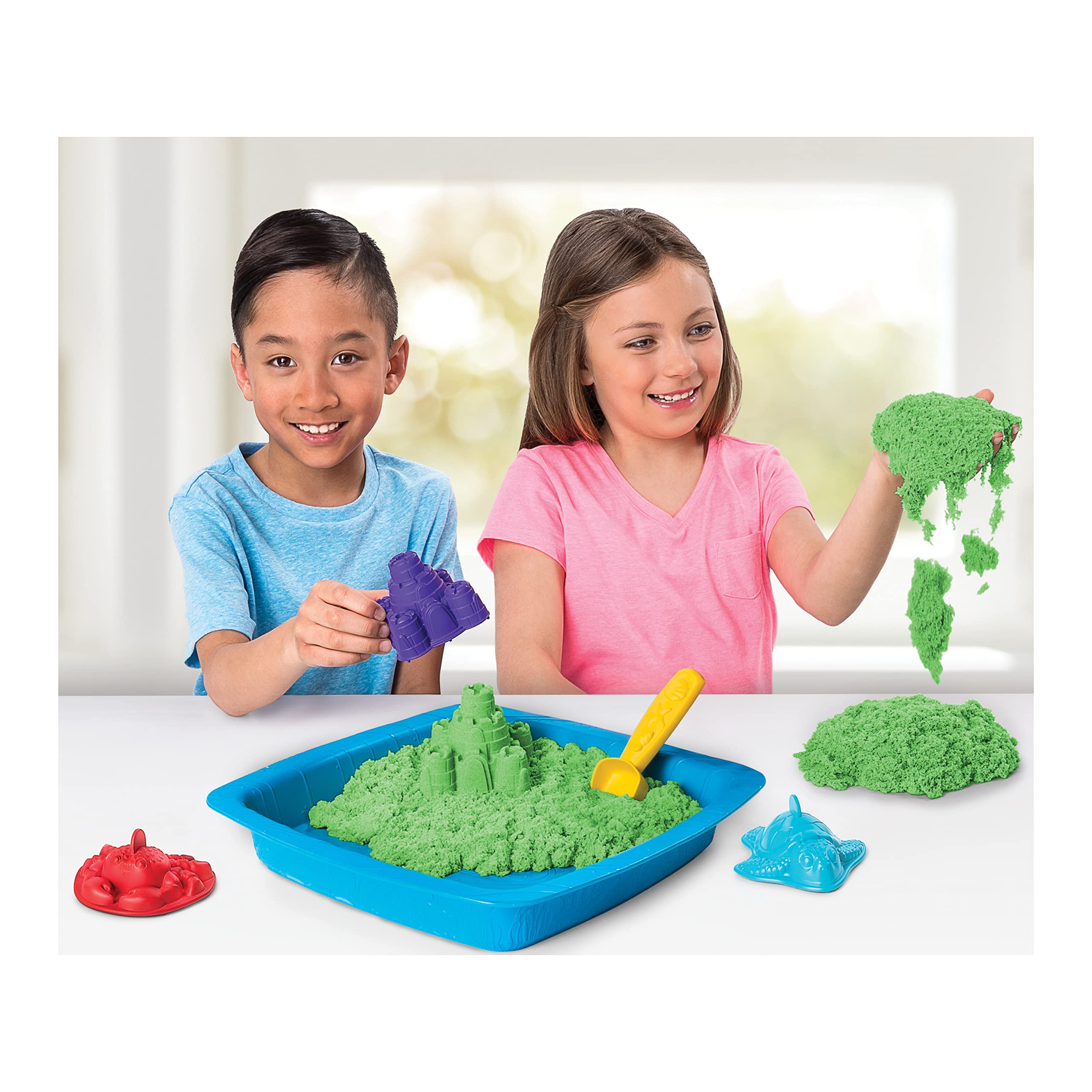 Kinetic Sand sandbox tray keeps play contained for indoor fun and easy cleanup.