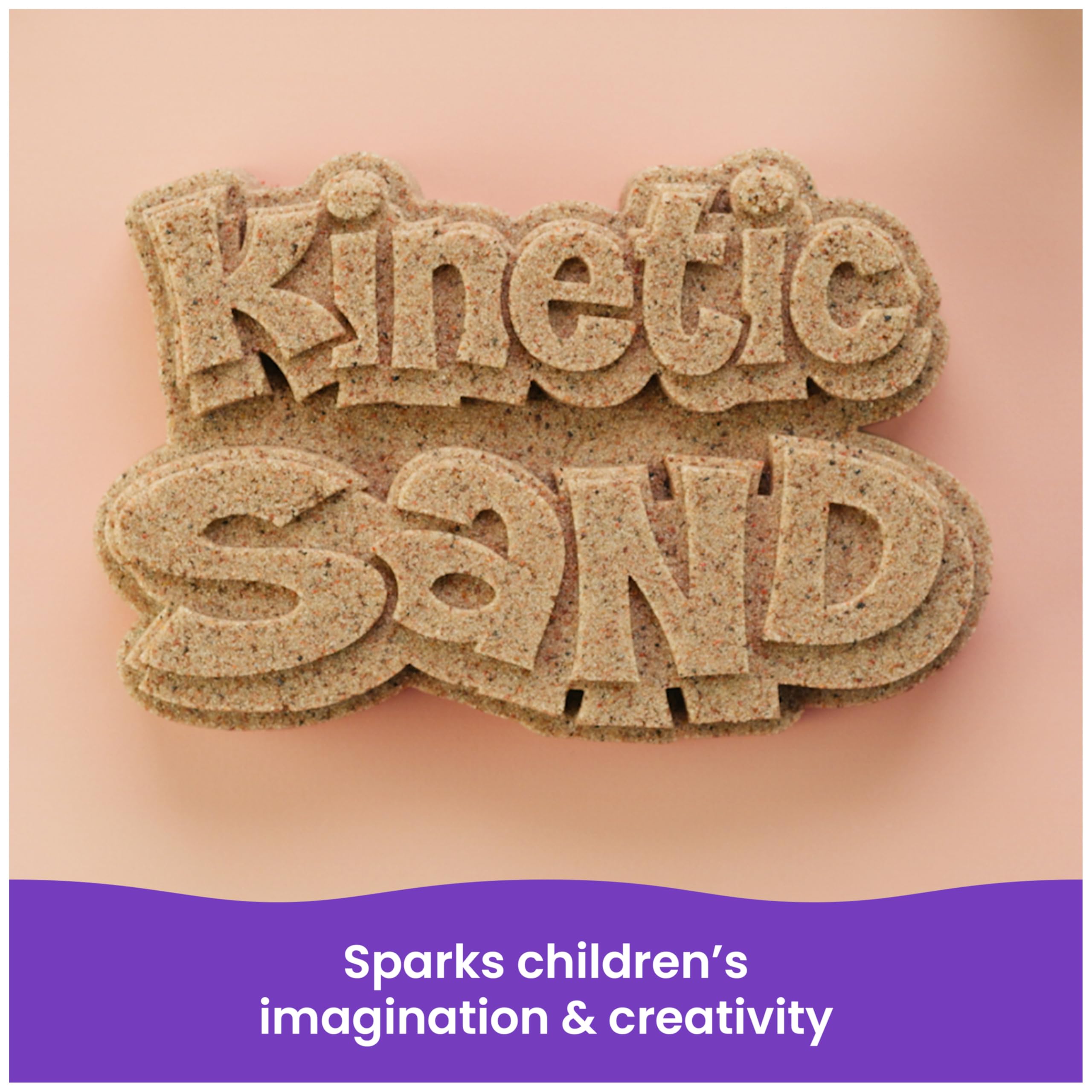Hand holding portion of Kinetic Sand to show scale and manageable portioning