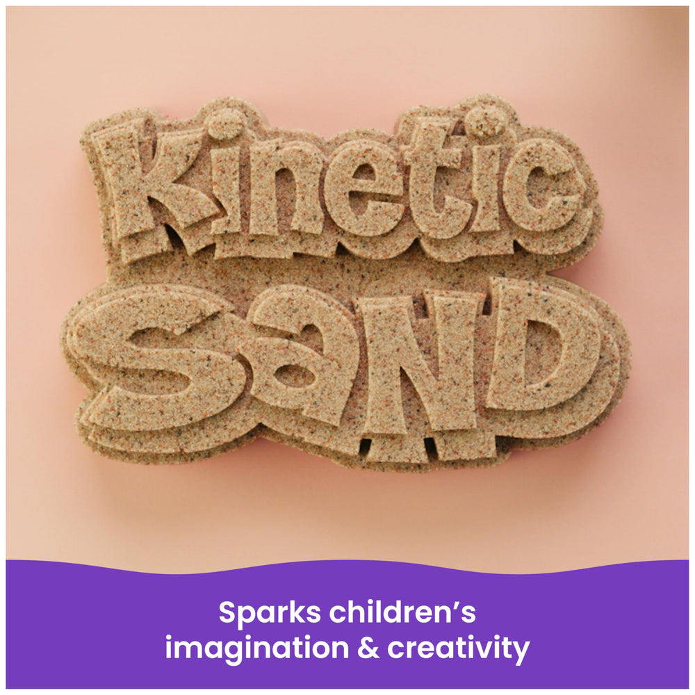 Hand holding portion of Kinetic Sand to show scale and manageable portioning