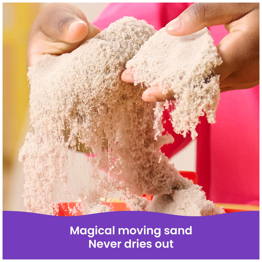 Kinetic Sand beside a child’s hand showing toy scale and suitability