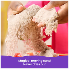 Kinetic Sand beside a child’s hand showing toy scale and suitability
