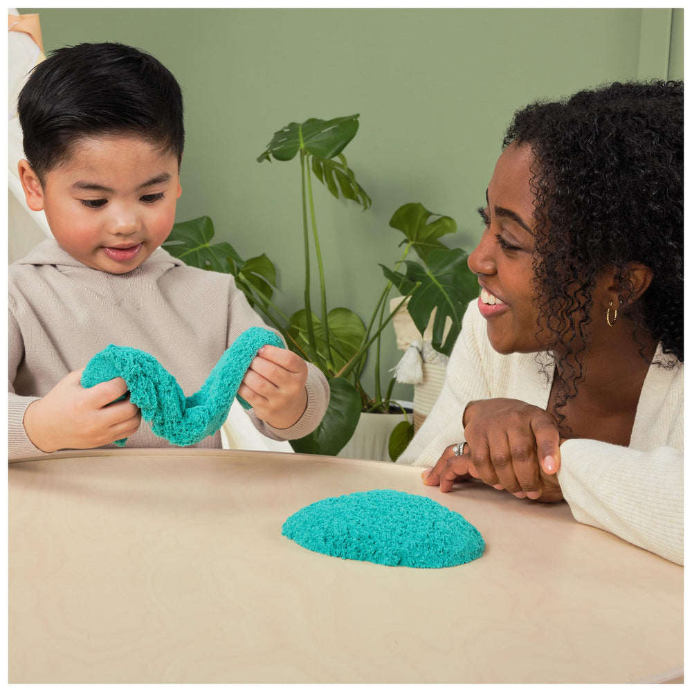 Twinkly Teal Kinetic Sand invites imaginative, creative play and repeat builds.
