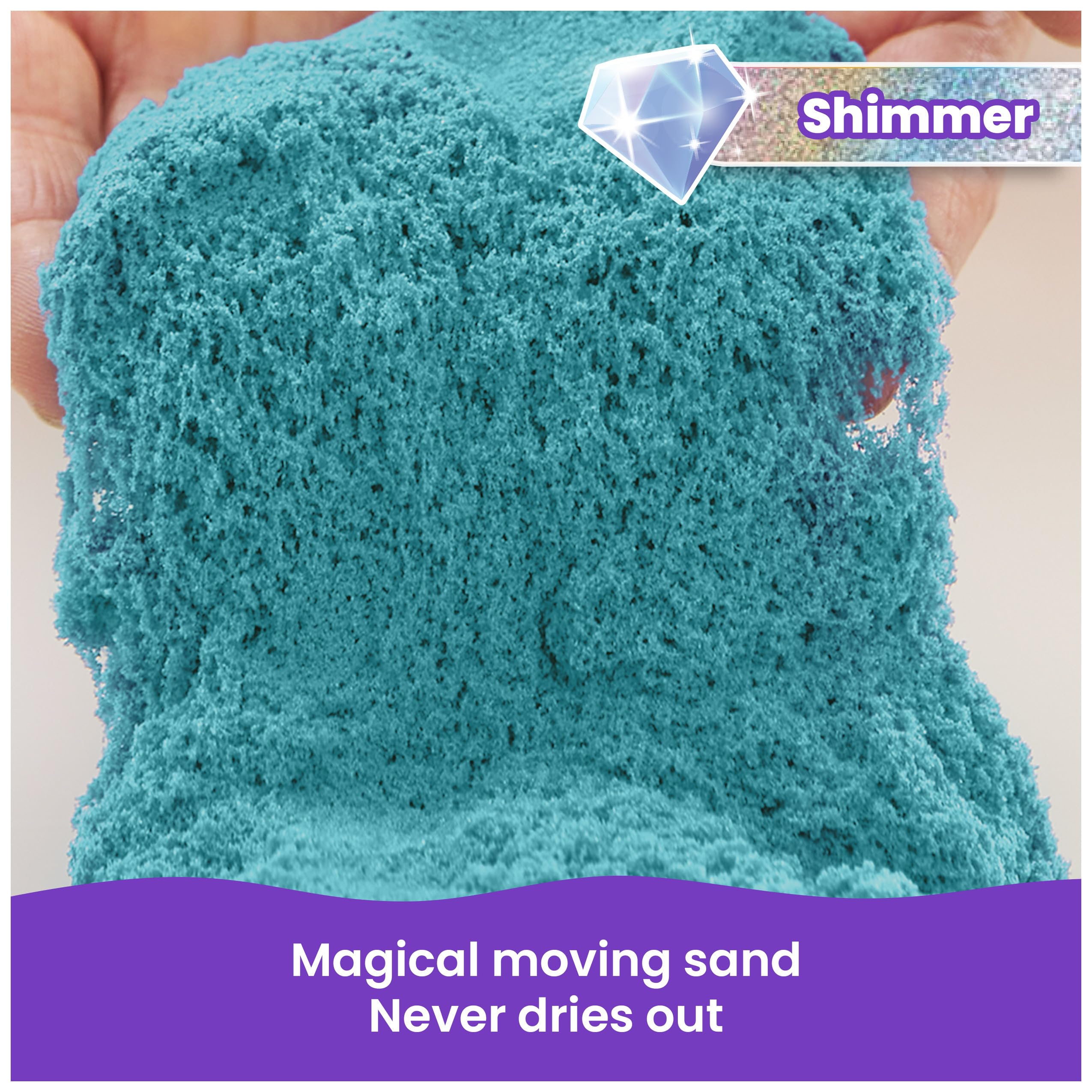Twinkly Teal Kinetic Sand shows squishing and molding for tactile sensory exploration.