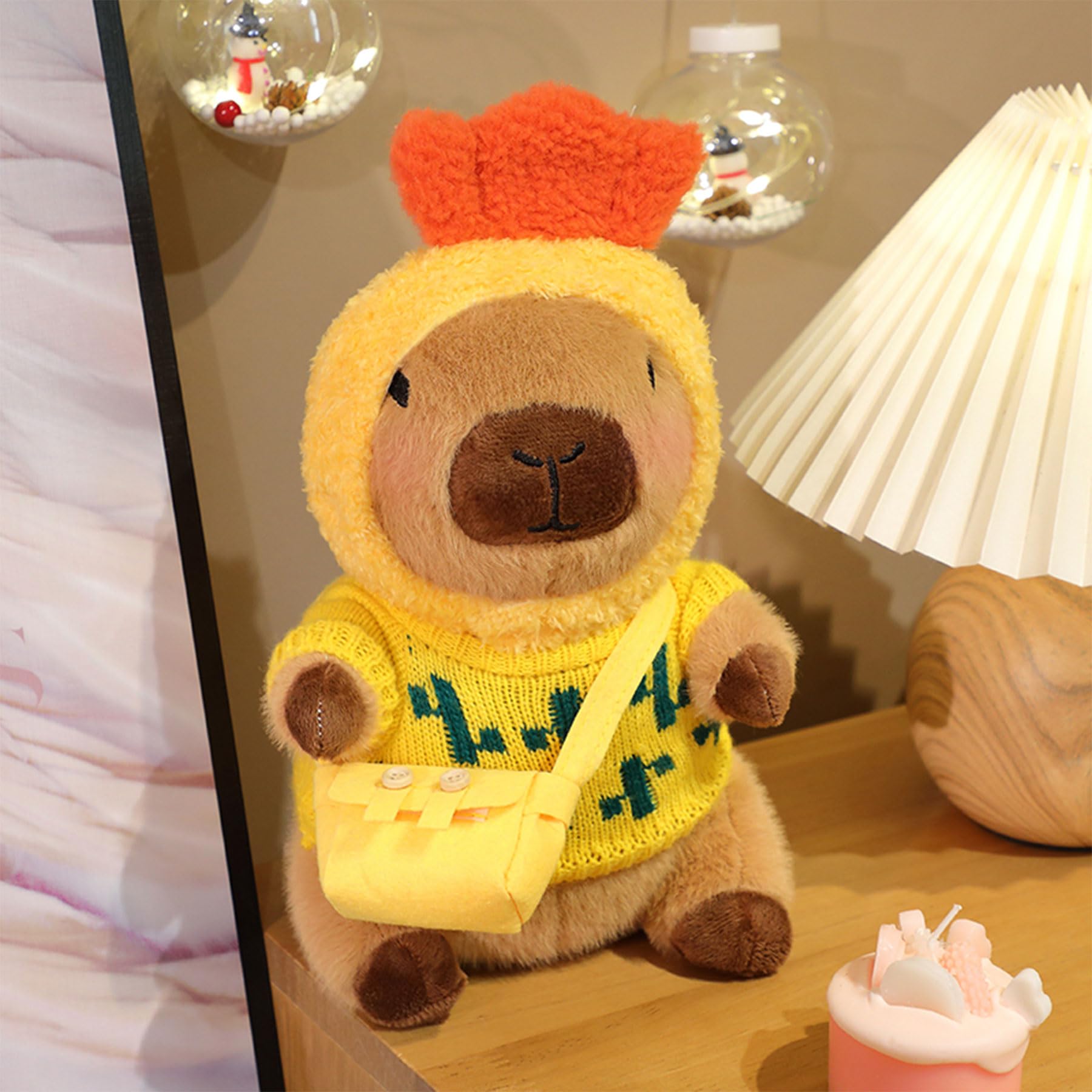Four sweaters from the Kireidane capybara plush wardrobe in soft fabric