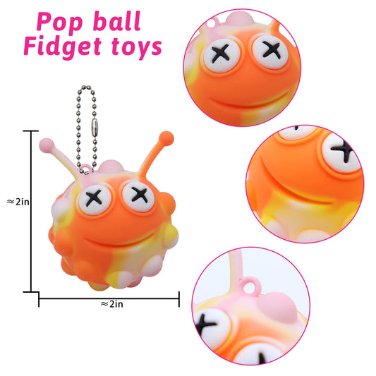 KissFree Animal Pop Ball keychain in hand showing popping action for focus