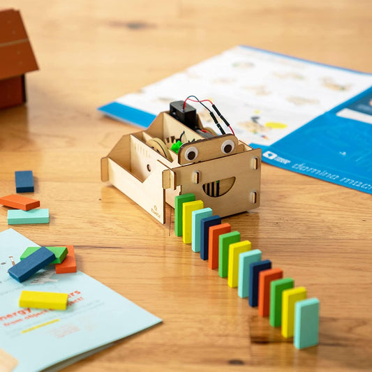 KiwiCo Domino Robot with wiggle eyes demonstrates playful automation for curious minds.
