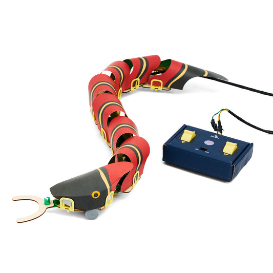 KiwiCo remote-controlled snake robot being assembled to learn electronics firsthand.