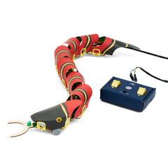 KiwiCo remote-controlled snake robot being assembled to learn electronics firsthand.