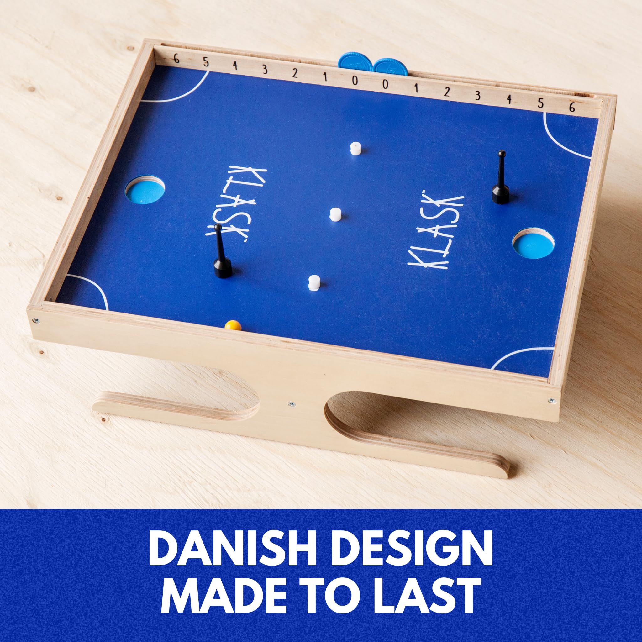 KLASK magnetic handles action shows fast, skillful play with responsive control.