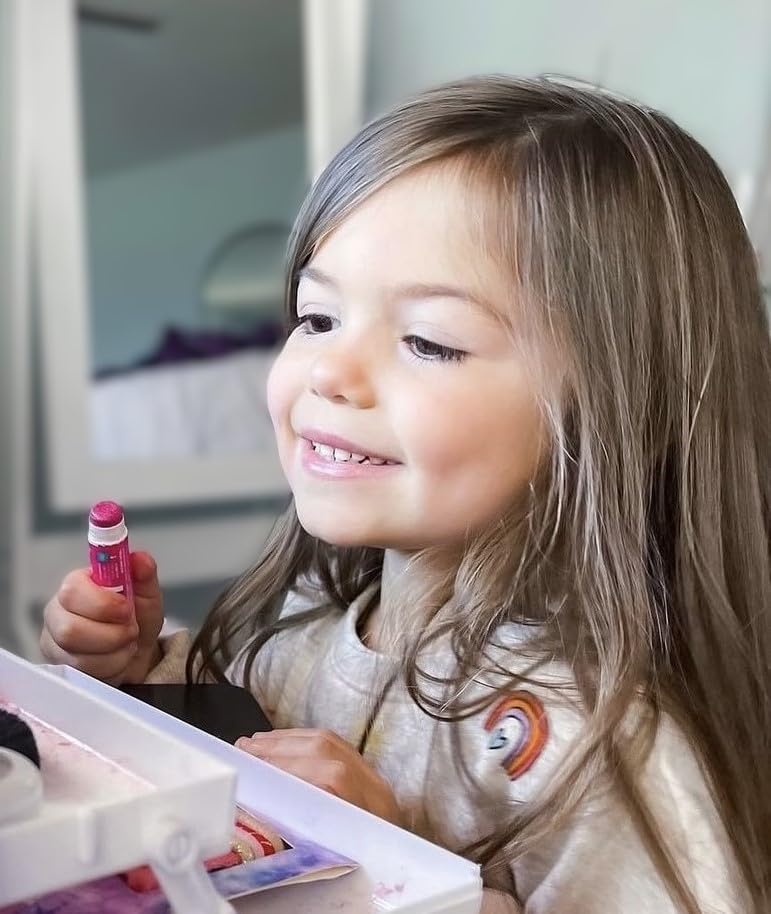 Klee Naturals Luna Star Candied Grape lip shimmer offers playful shine for little smiles.