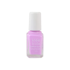 Klee Naturals kit beside an adult hand to show compact size and portability