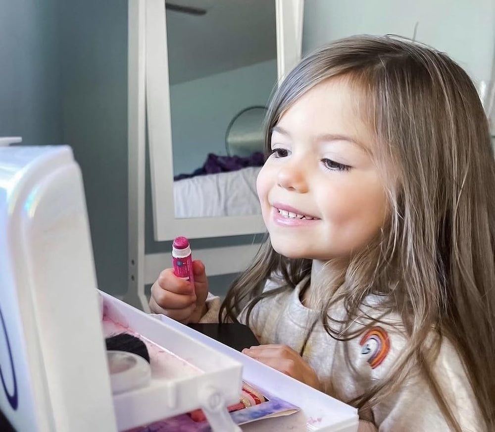 Klee Naturals Strawberry lip shimmer provides fruity shine for kids.