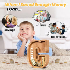 KMC piggy bank plexiglass panel lets kids watch savings grow and learn.
