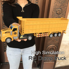 KNACKTOYZ RC Dump Truck side view highlights dual batteries for extended playtime