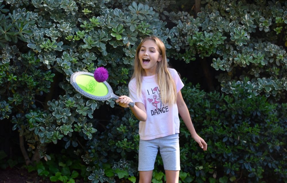 Koosh ball ready for bouncing back and forth with the paddles