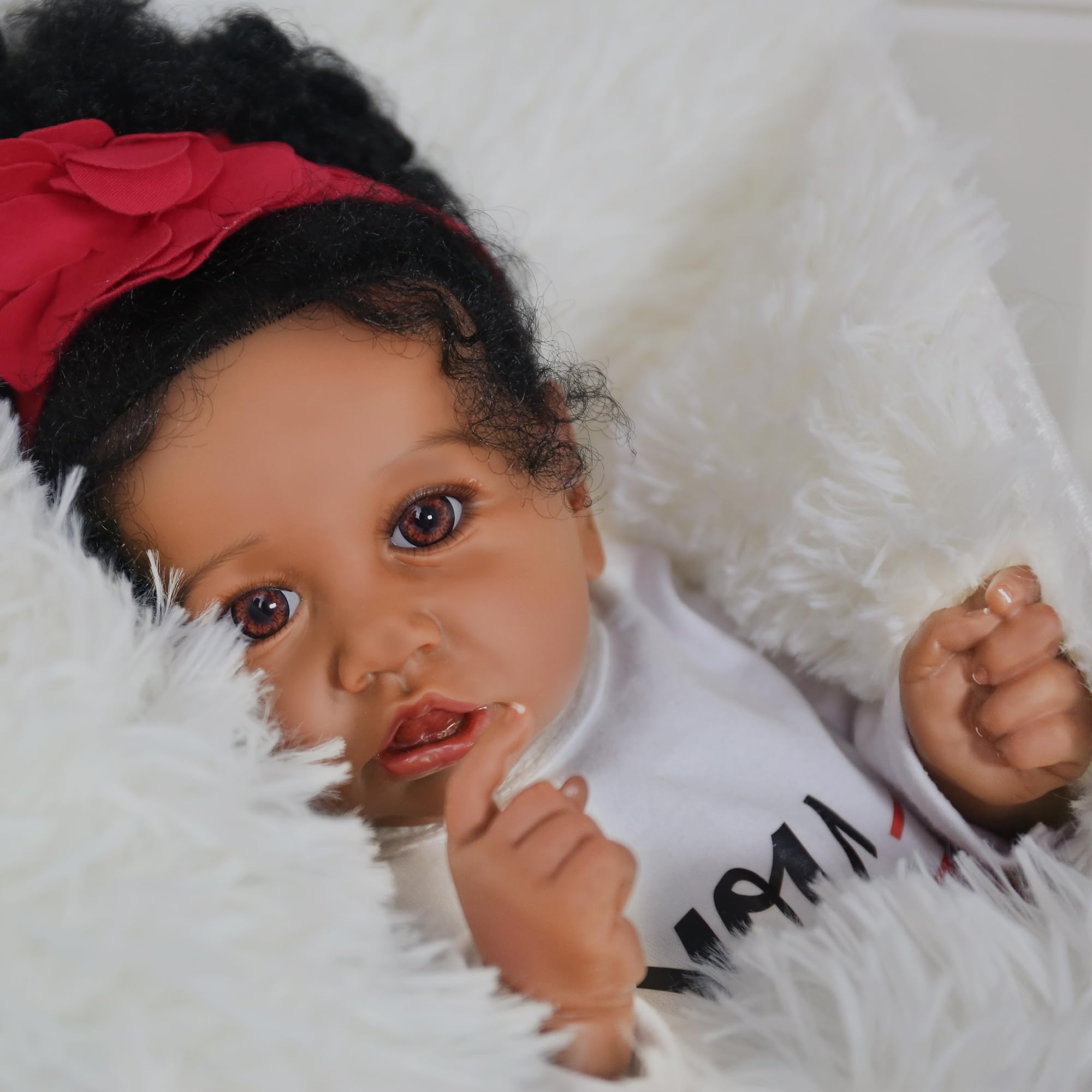 KSBD included suit and magnetic pacifier for authentic newborn styling