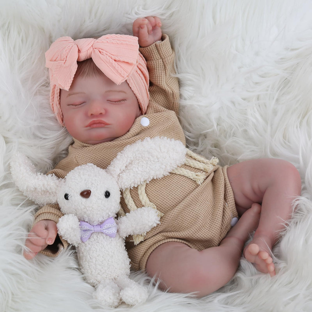 KSBD Lifelike Reborn Baby Doll wearing clothes showcasing true newborn styling.